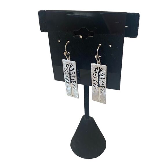 Simple beauty is defined in these Muted Silver Toned Rectangular Drop Earrings. - Picture 3 of 5